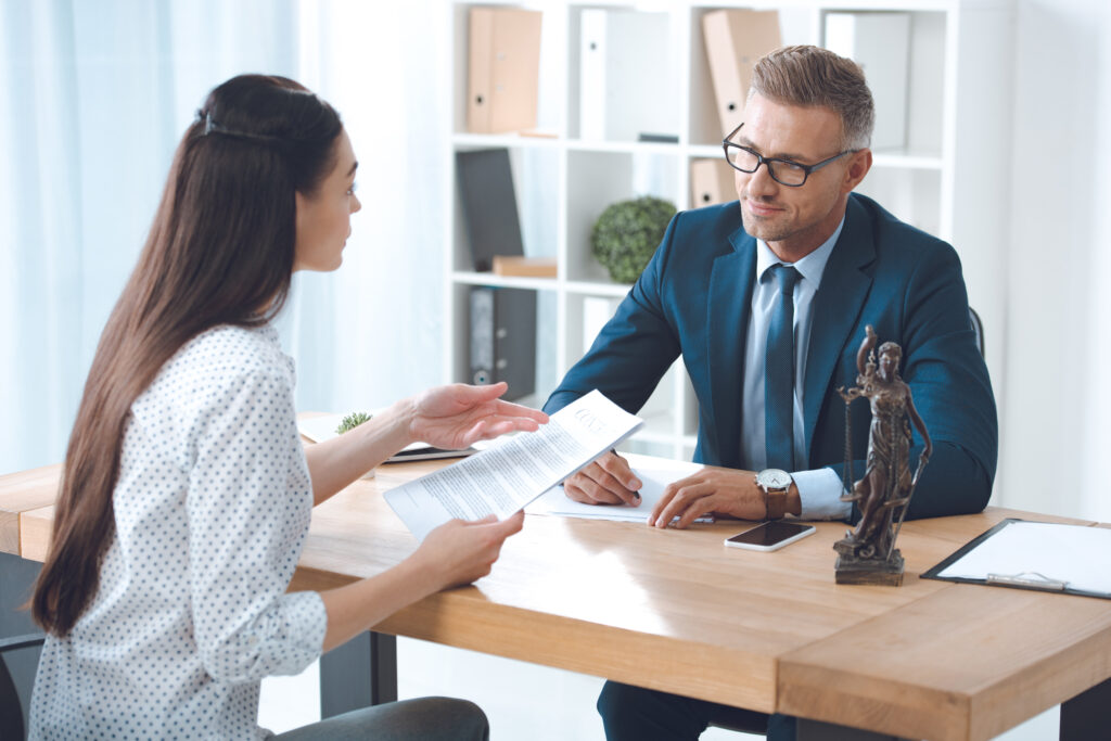 Lawyer consulting with a client in their office